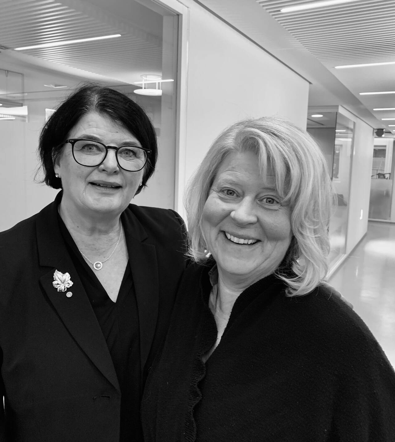 Socialtjänstministern och Akademikerförbundet SSR:s ordförande.